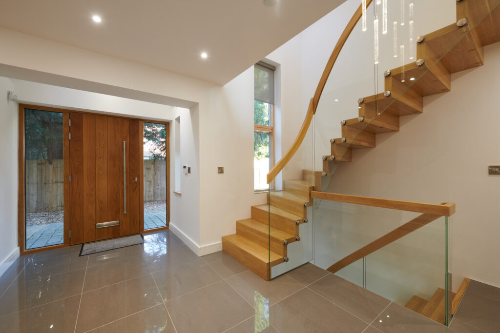 Private Housing Development, Stevenage entrace hallway with bespoke wooden staircase